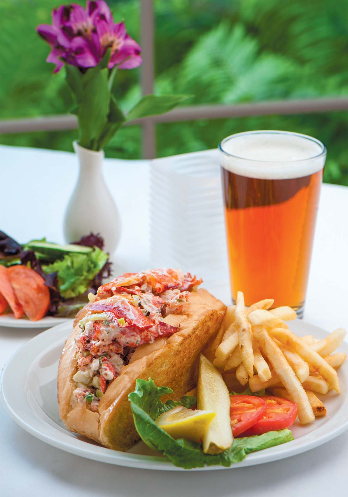 Whether it’s the New England Lobster Boil or the Lobster Roll (shown here), lobster helps to give Harbor Fish Market & Grille its New England flavor. Contributed photo